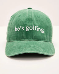Hes Golfing Baseball Hat