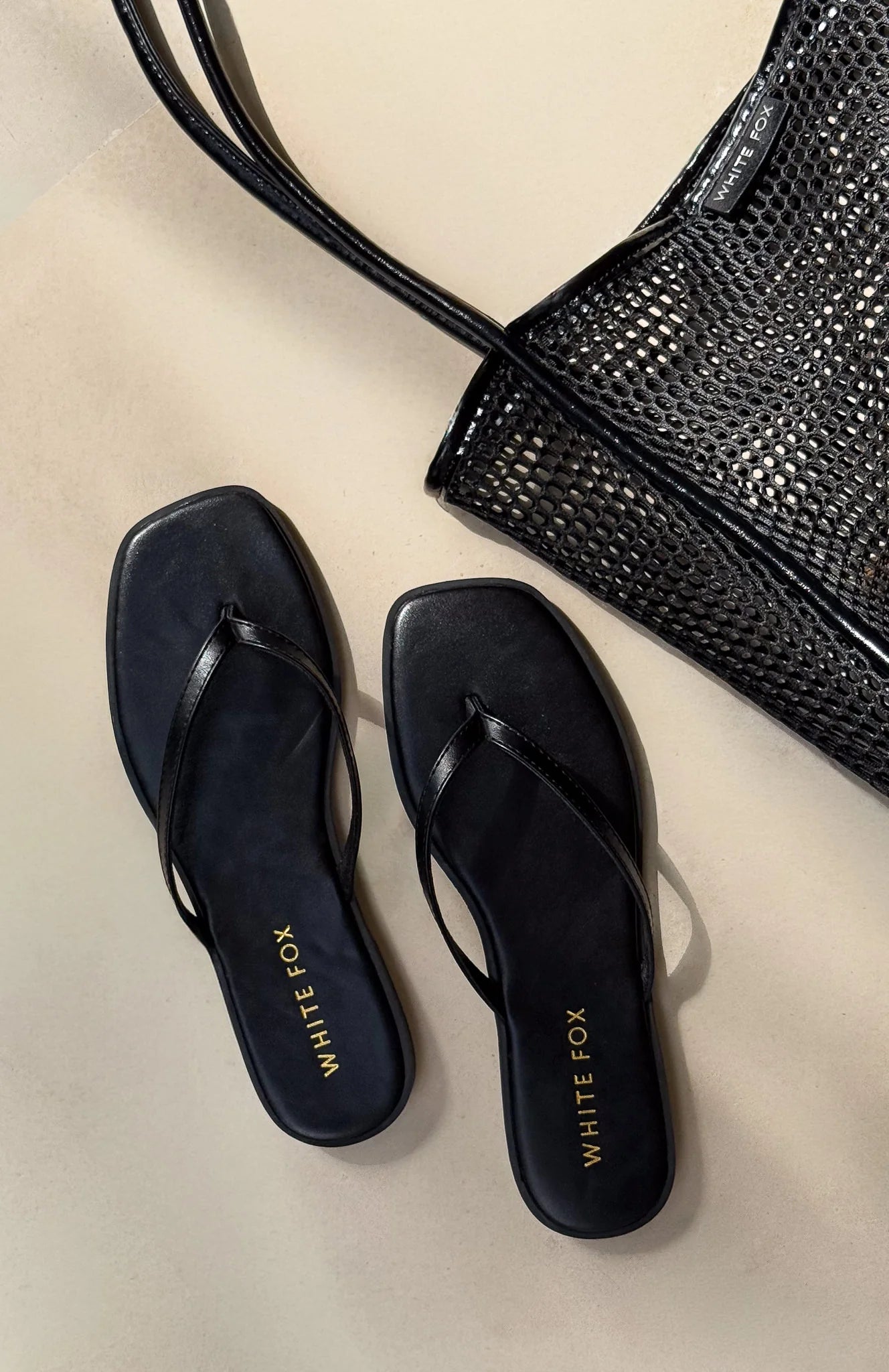 Breccan Thong Sandals Black