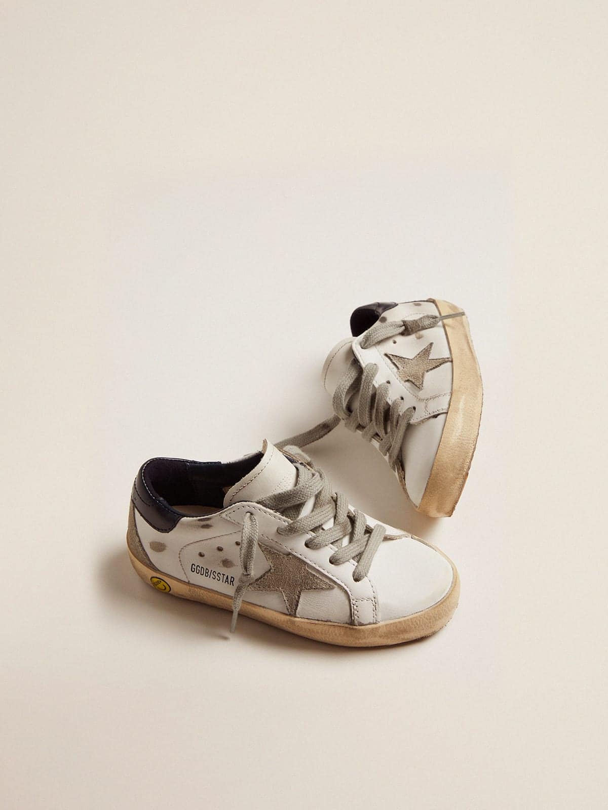 Junior Super-Star with ice-gray suede star and navy-blue leather heel tab