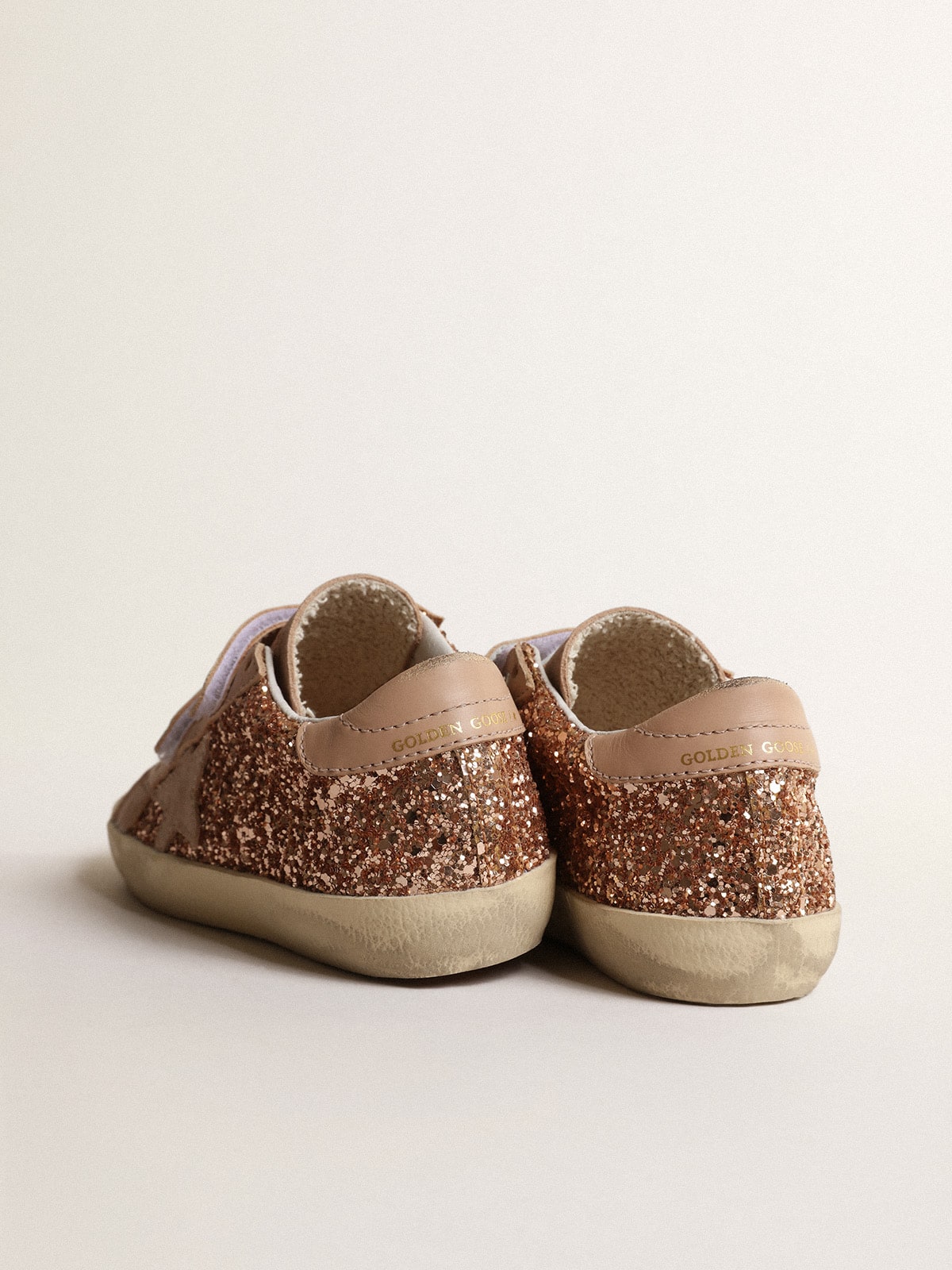 Old School Junior in peach-pink glitter with pink suede star