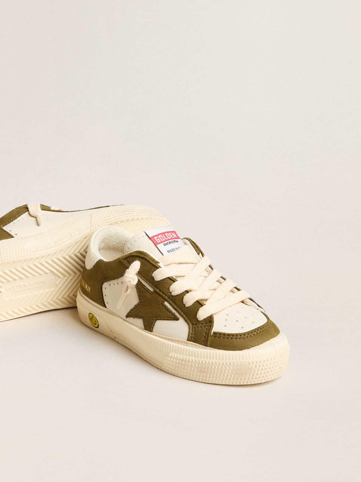 May Junior in white and military green leather