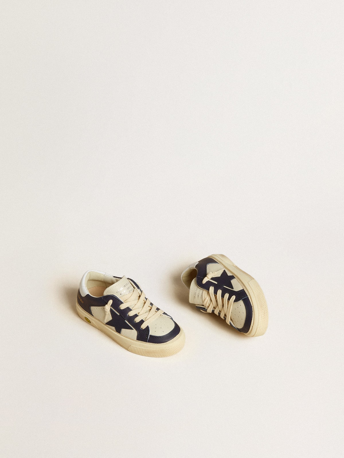 Junior May in white and blue leather with leather star and heel tab