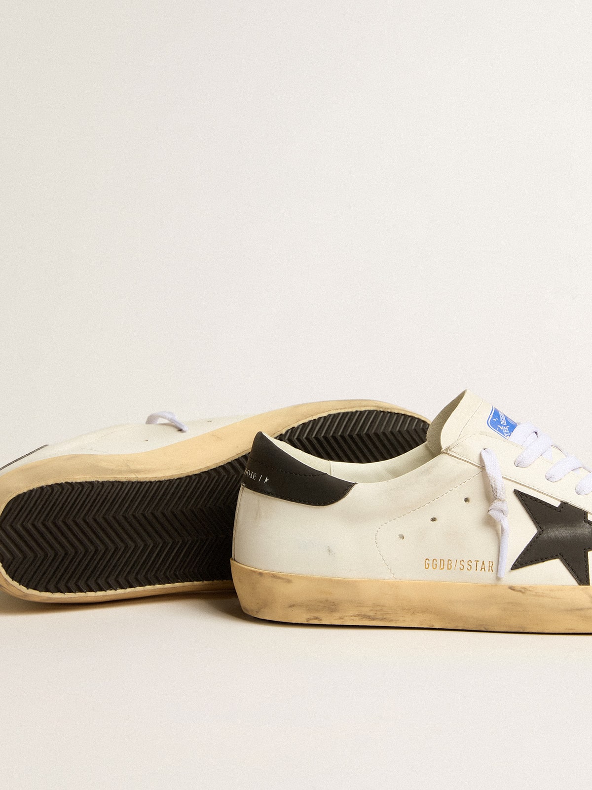 White bio-based men's Super-Star with black star and heel tab