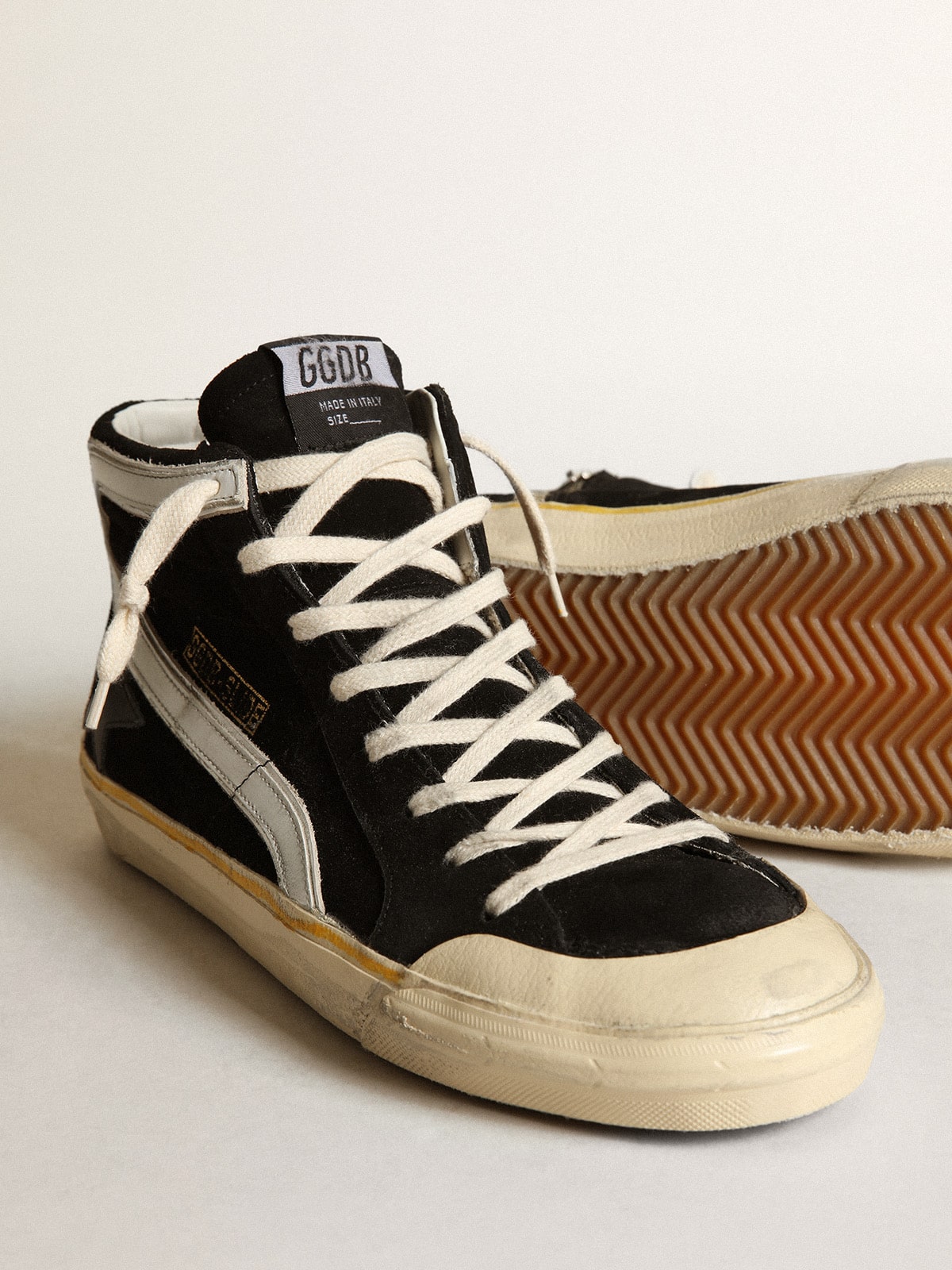 Men's Slide Penstar in black suede with black star and white flash