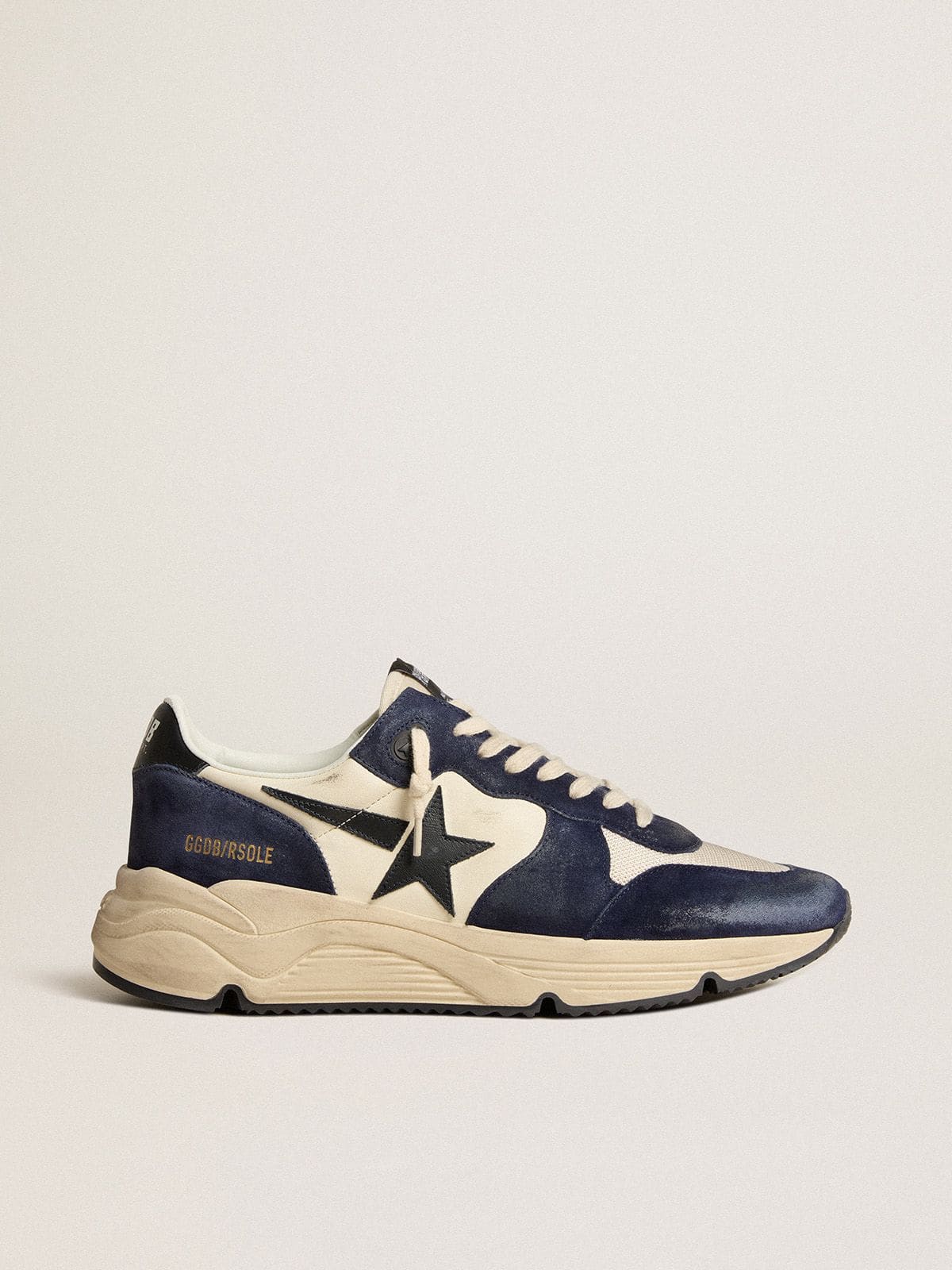 Men’s Running Sole in black and beige nappa leather with black star and heel tab