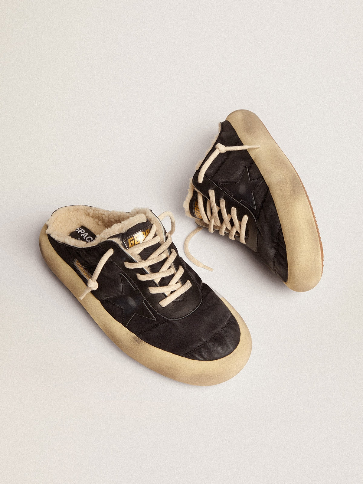 Men's Space-Star Sabot shoes in quilted black nylon with shearling lining