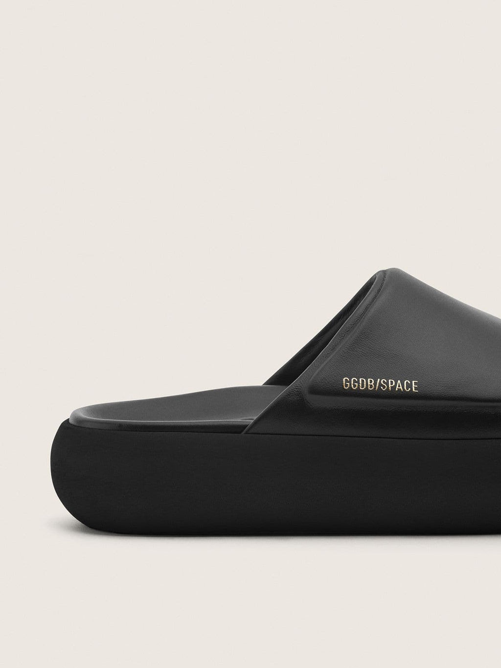Men's Space-Star Slide slip-ons in black leather