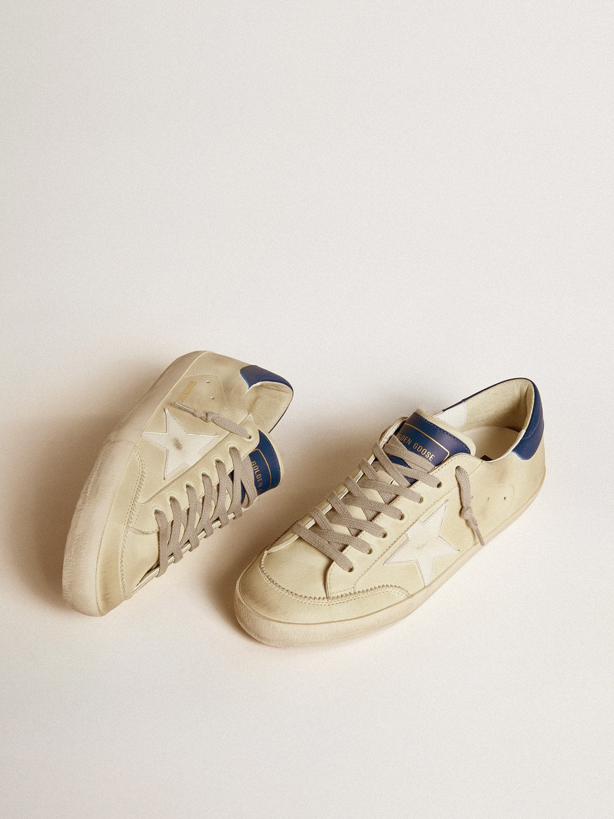 Men's Super-Star LTD in nubuck with white leather star and blue heel tab