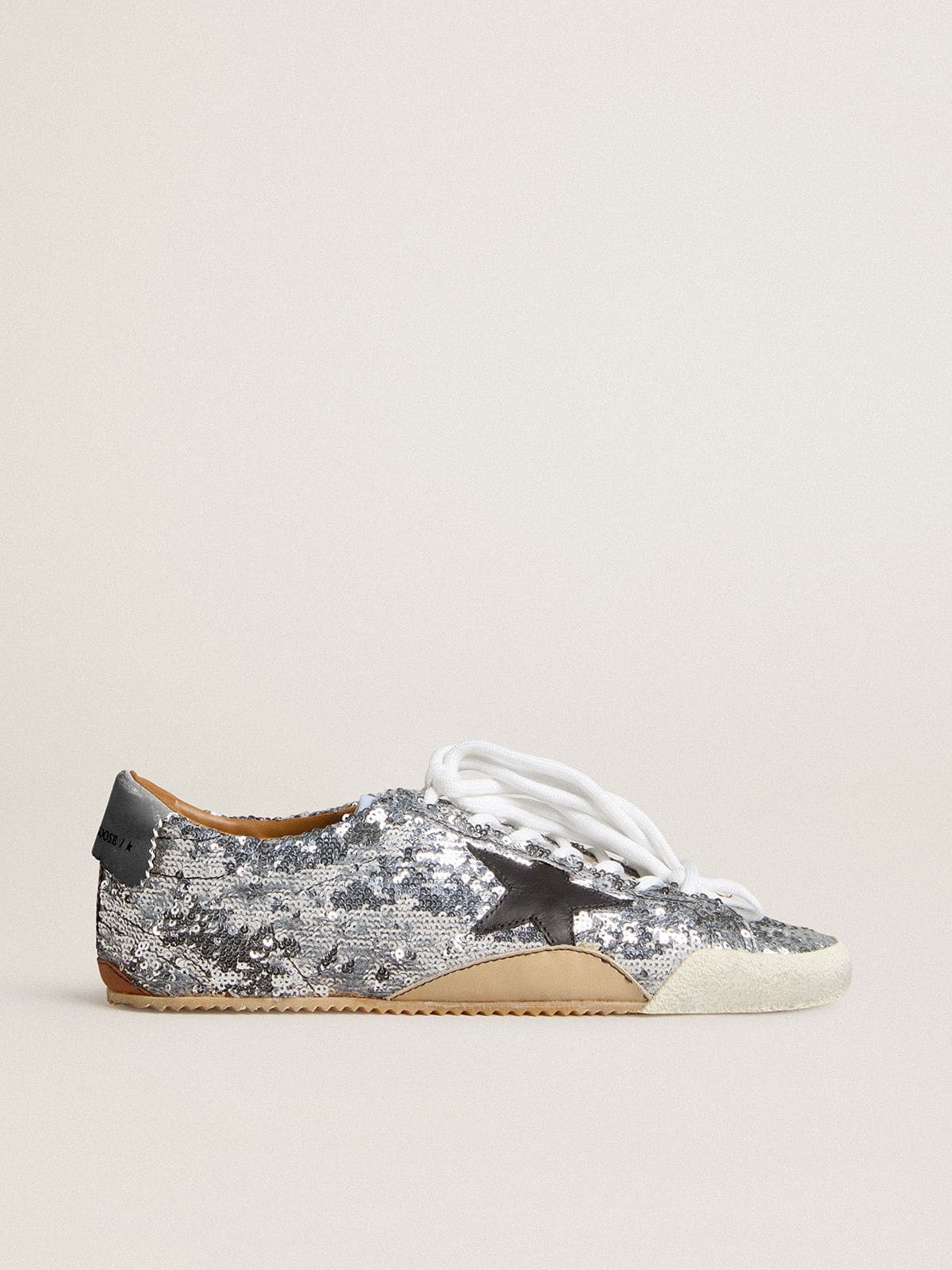 Men's True-Star in silver sequins with black star and beige leather heel tab