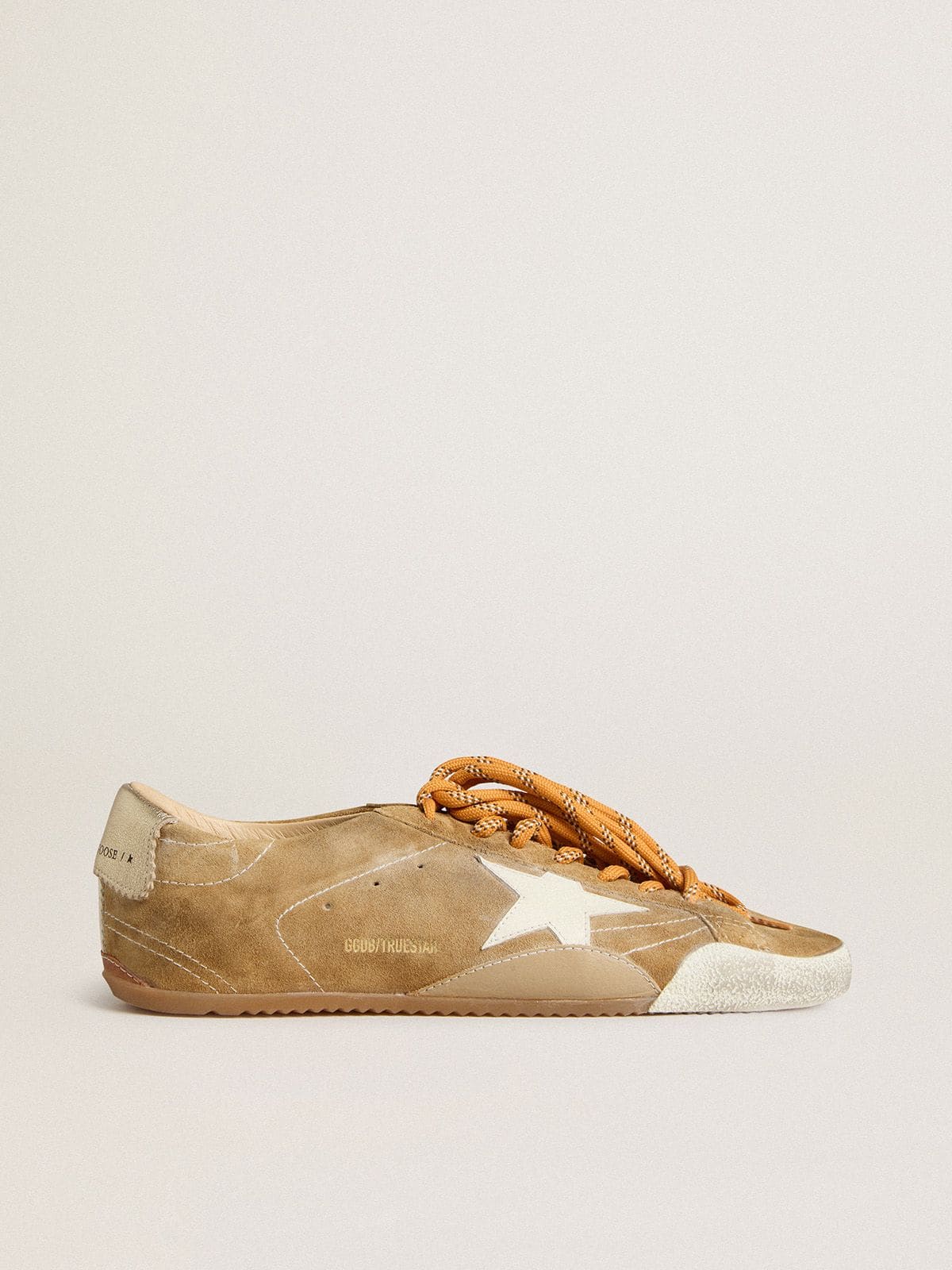 Men's True-Star in tobacco-colored suede with white star and platinum heel tab