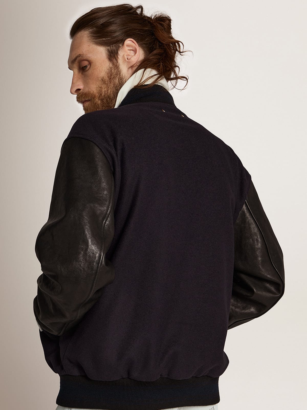 Men's bomber jacket in dark blue wool with leather sleeves