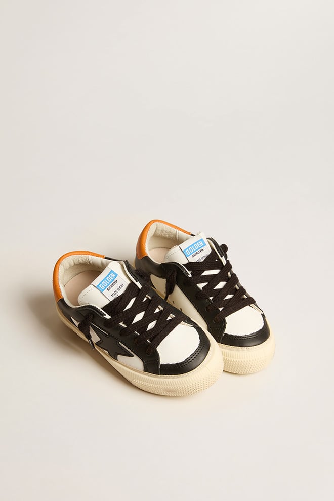 May Teen in black and white leather with black star and orange heel tab