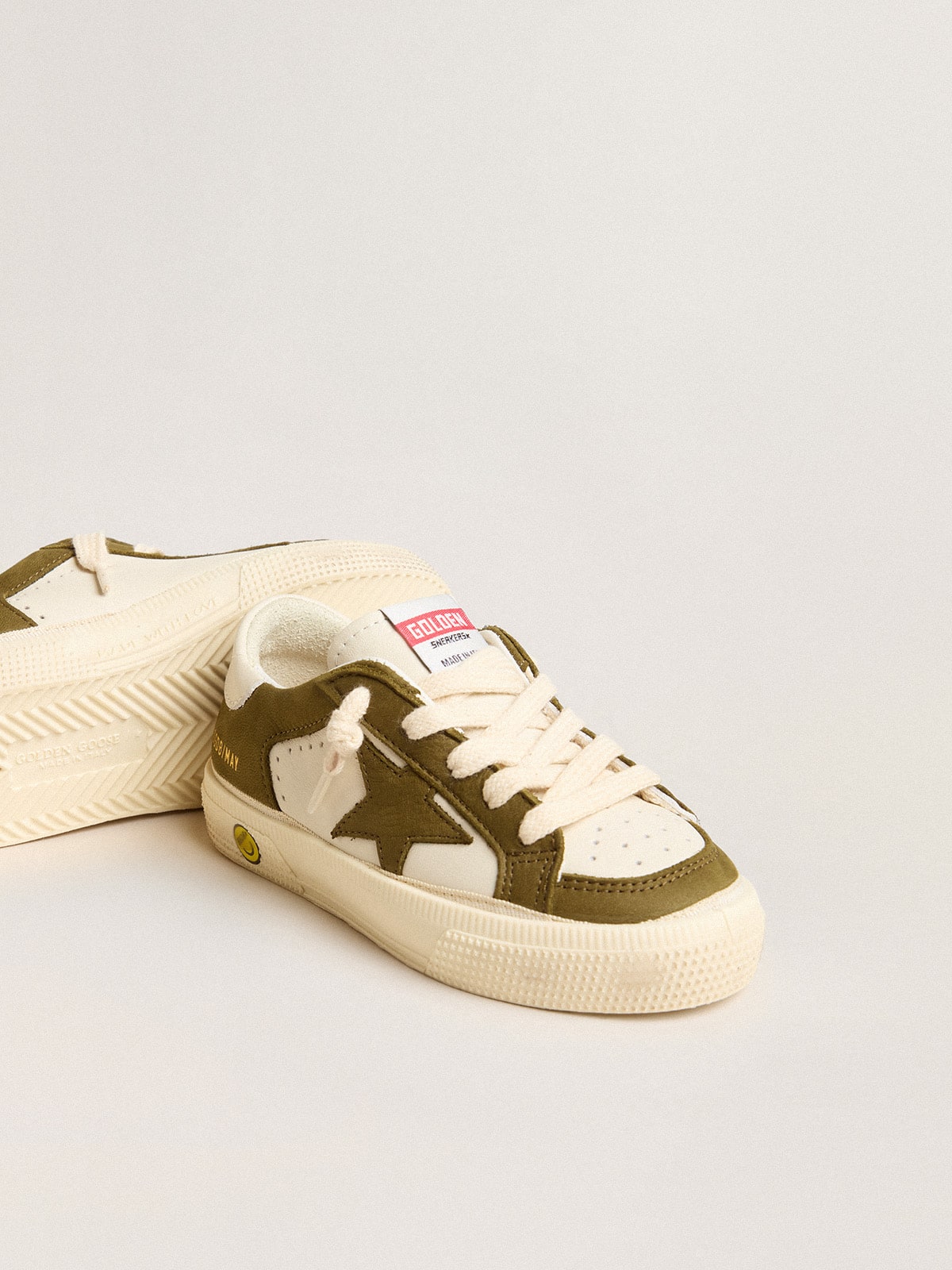 May Teen in white and military green leather