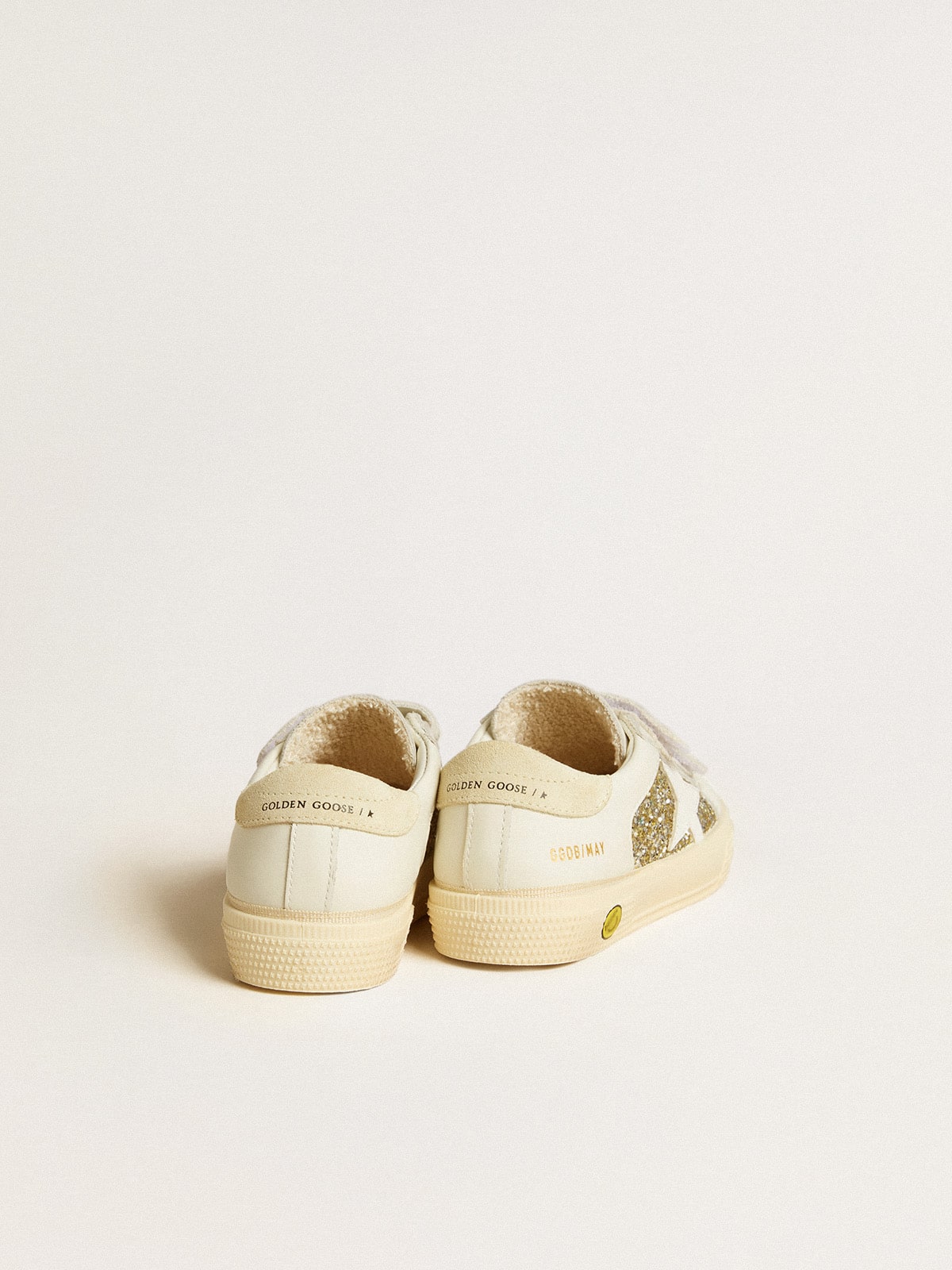 May Teen in white leather and gold glitter with white leather star