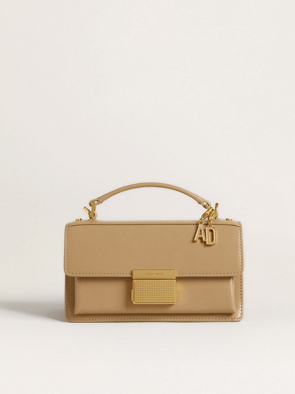 Letter A charm in gold-colored brass with crystals