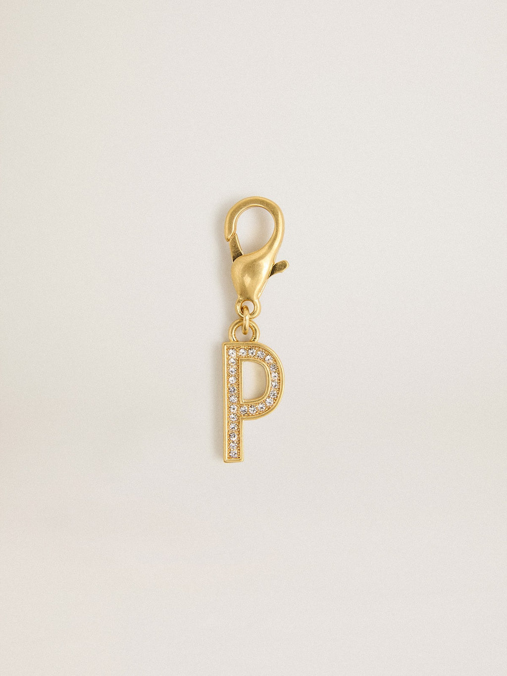 Letter P charm in gold-colored brass with crystals