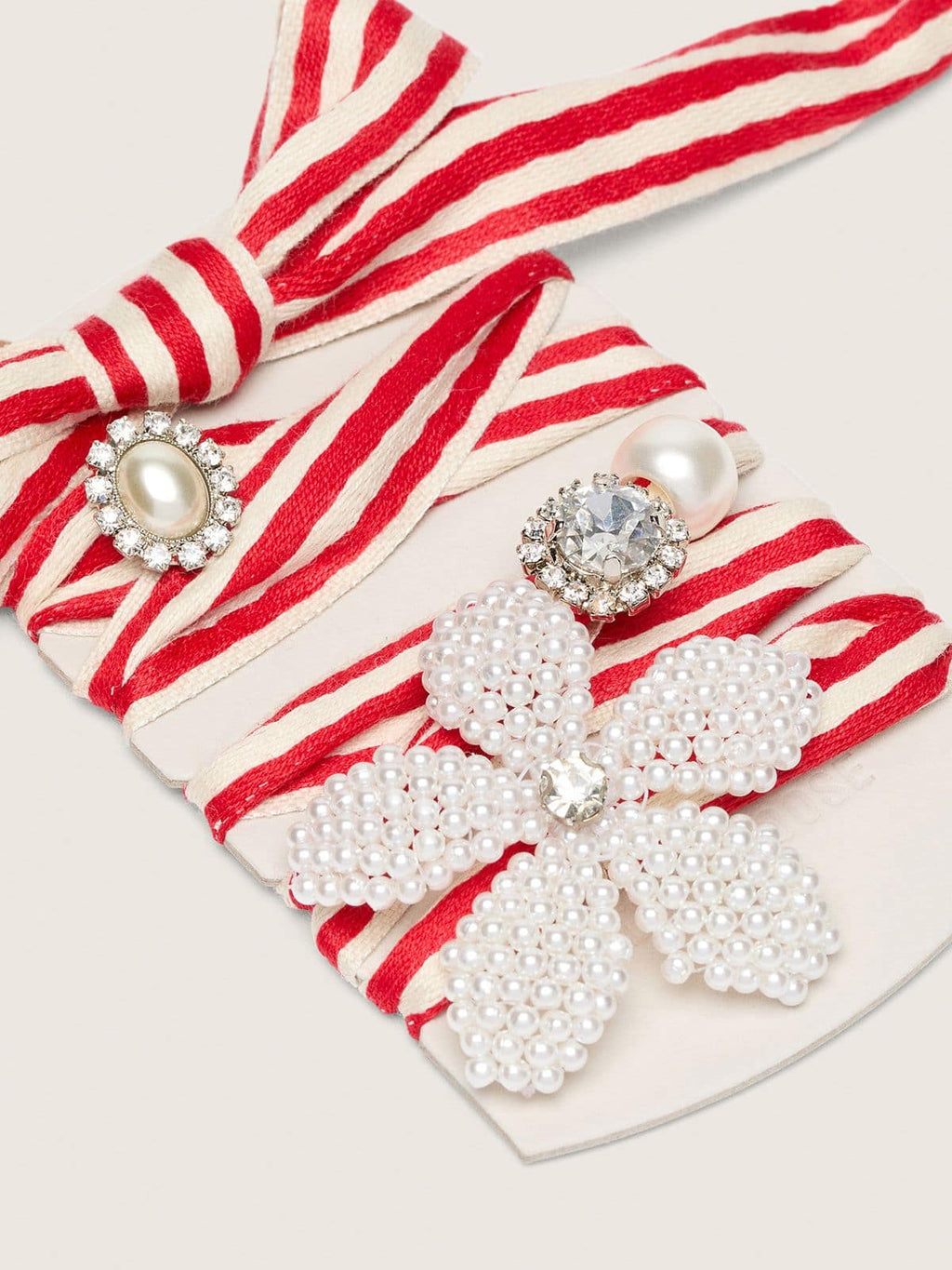 Skin "Playful" red and beige striped laces with appliqué charms