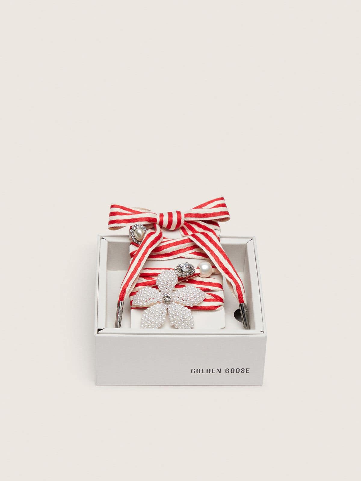 Skin "Playful" red and beige striped laces with appliqué charms
