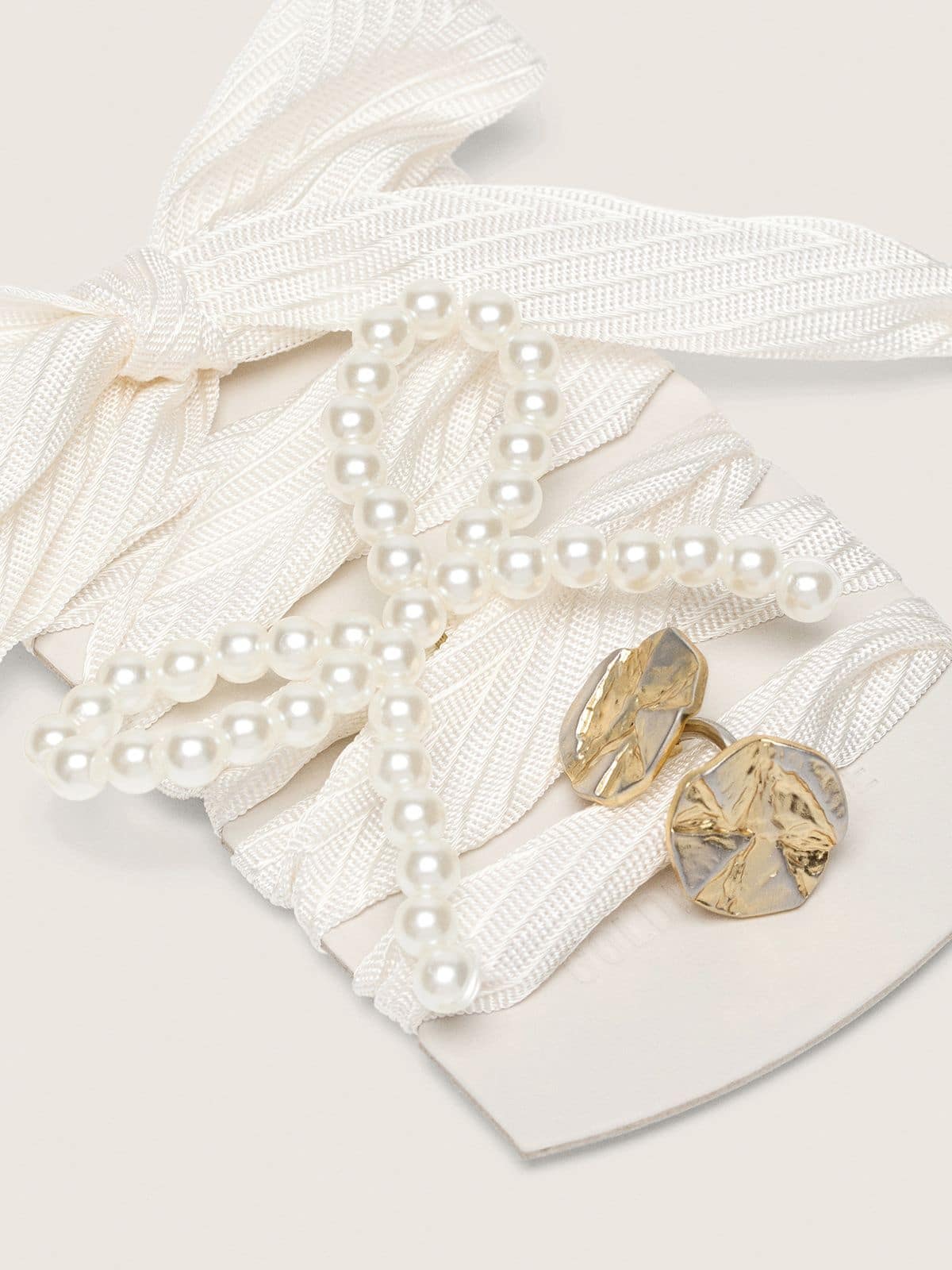 Skin "Sparkling" cream striped laces with appliqué beaded charm and golden charm