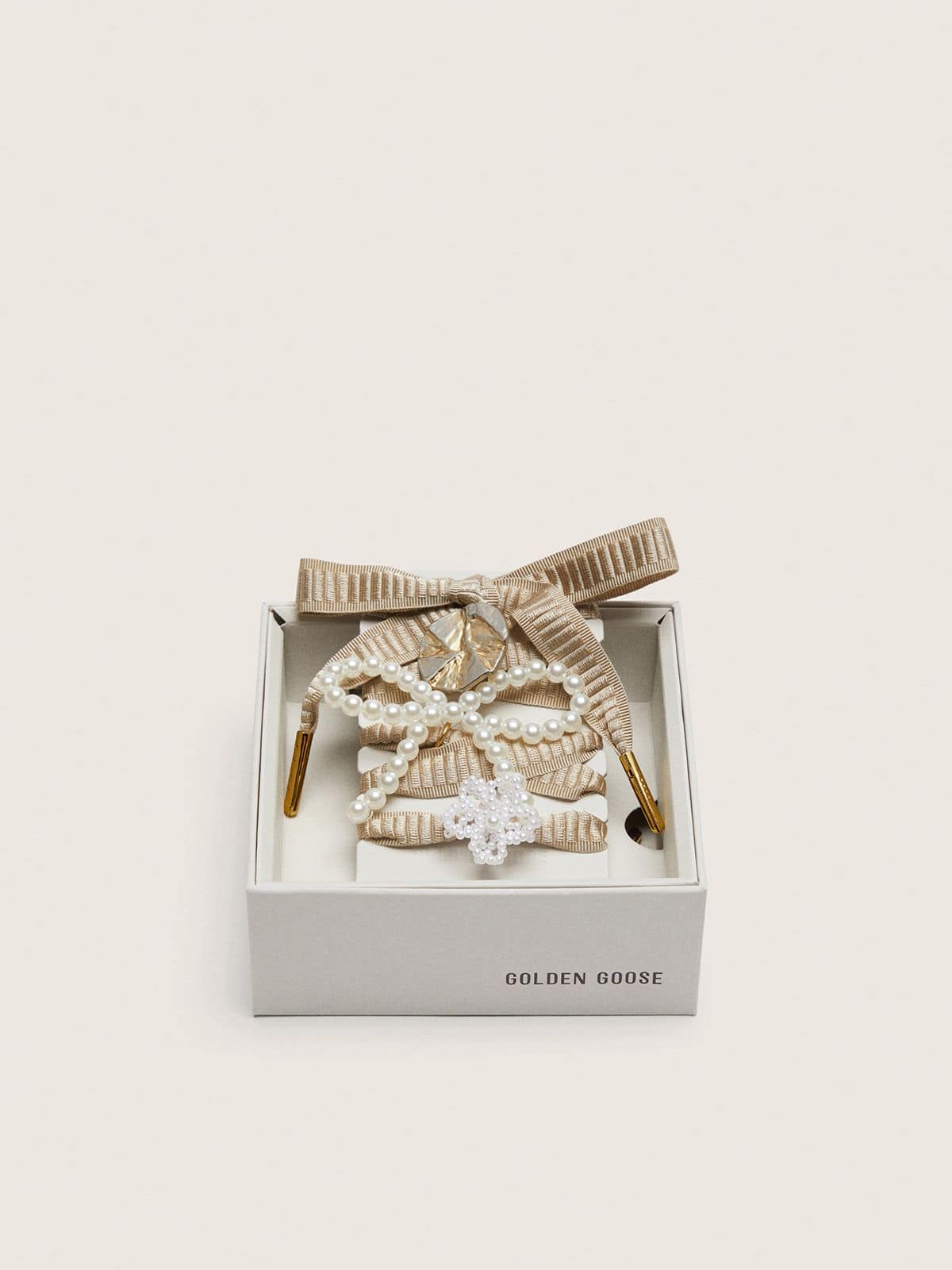 Skin "Sparkling" beige embroidered laces with appliqué beaded charms and gold charm