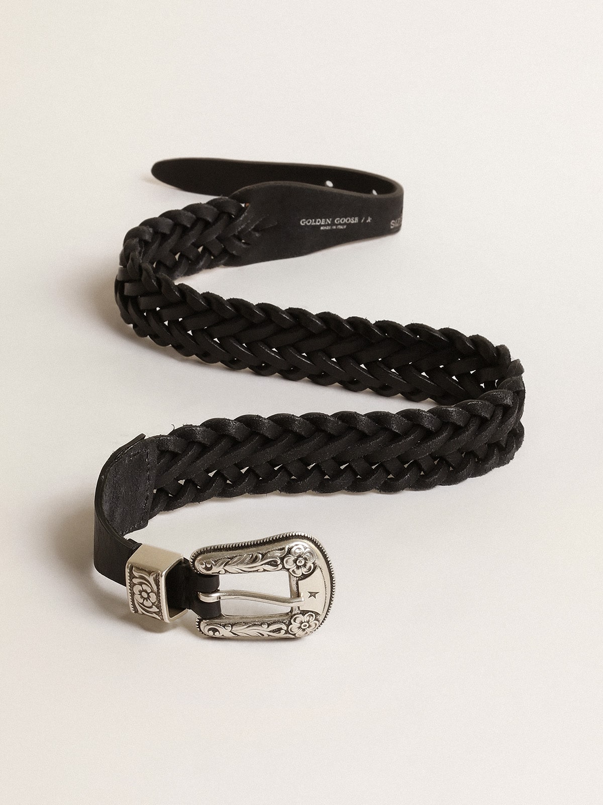 Belt in black braided leather with silver color buckle