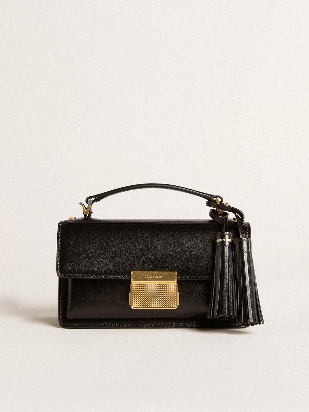 Small Venezia Bag in black boarded leather with gold details