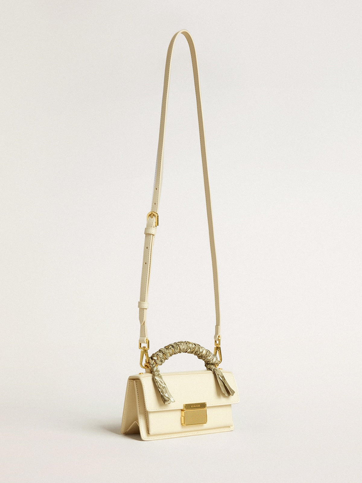Small Venezia Bag in butter-colored boarded leather with braided scarf