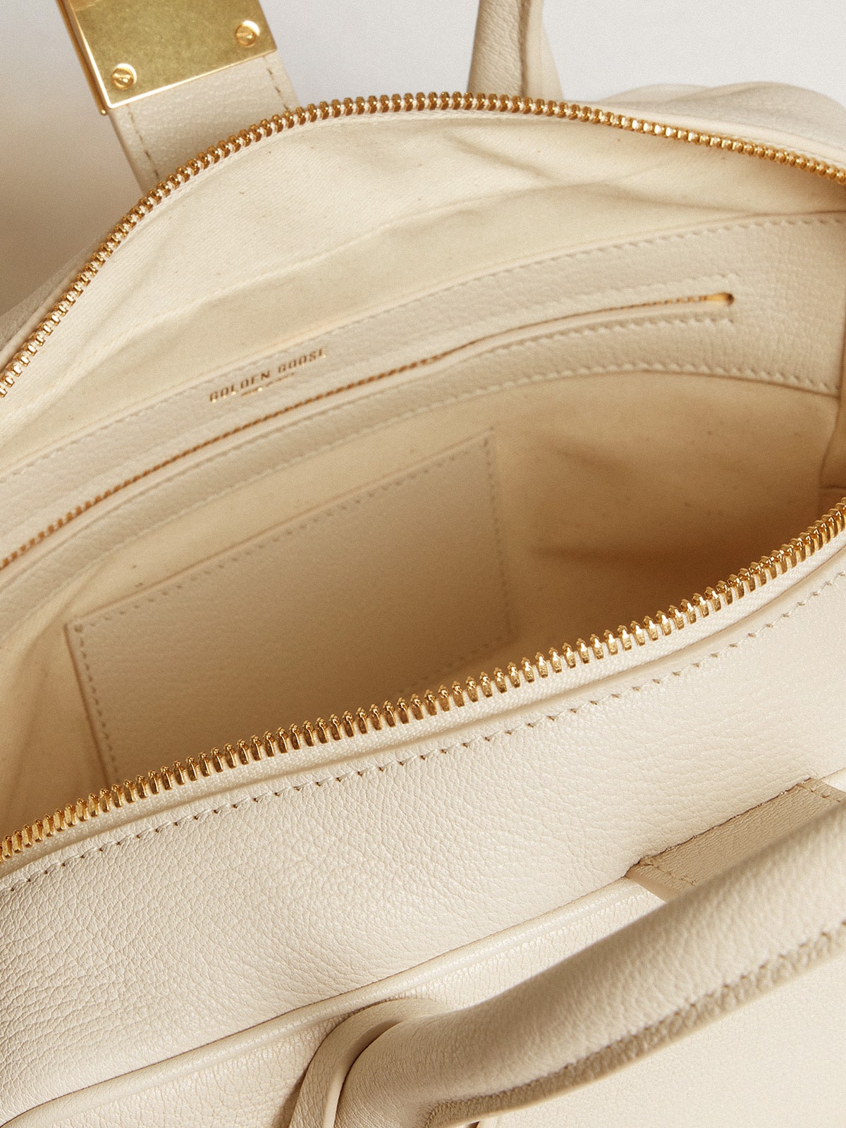 Vita Bag in butter-colored  leather with gold details