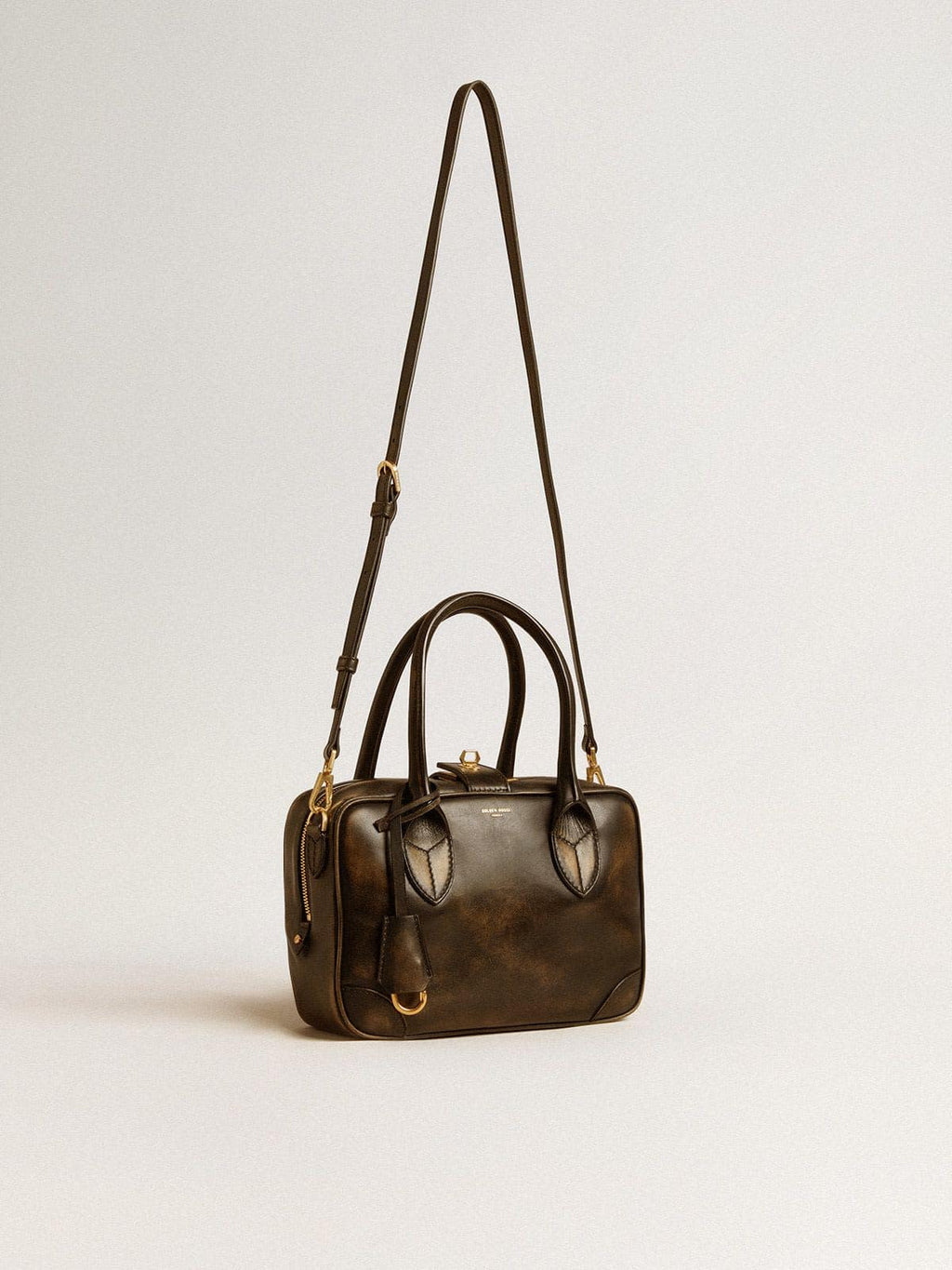 Vita Bag in black distressed leather with gold details
