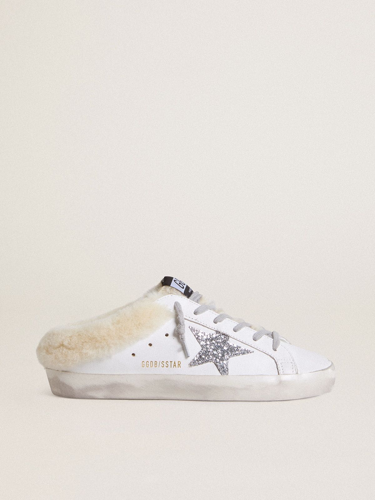 Super-Star Sabots in white leather with shearling lining and silver star