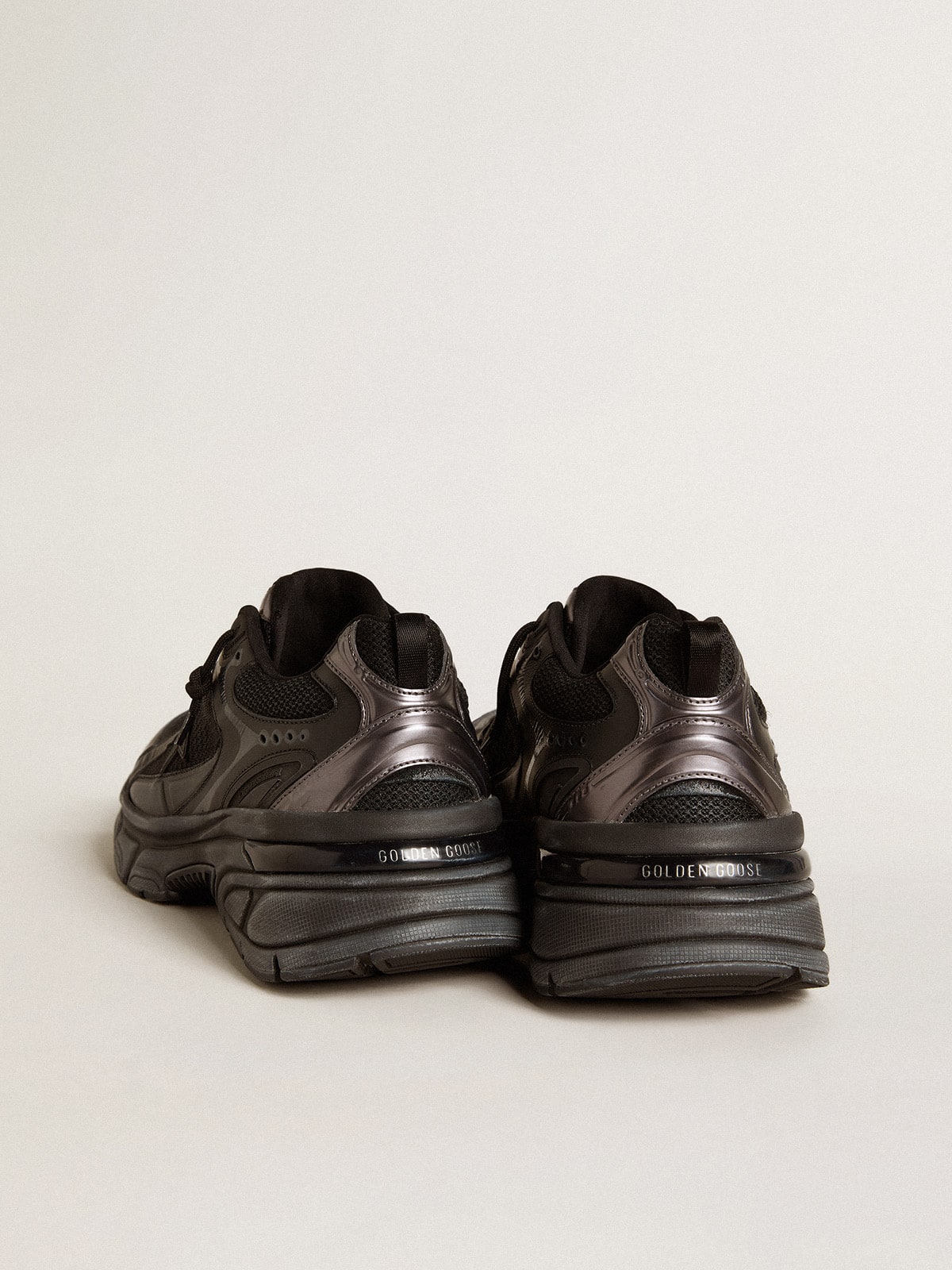 Women’s Lightstar with black leather and mesh upper and black star