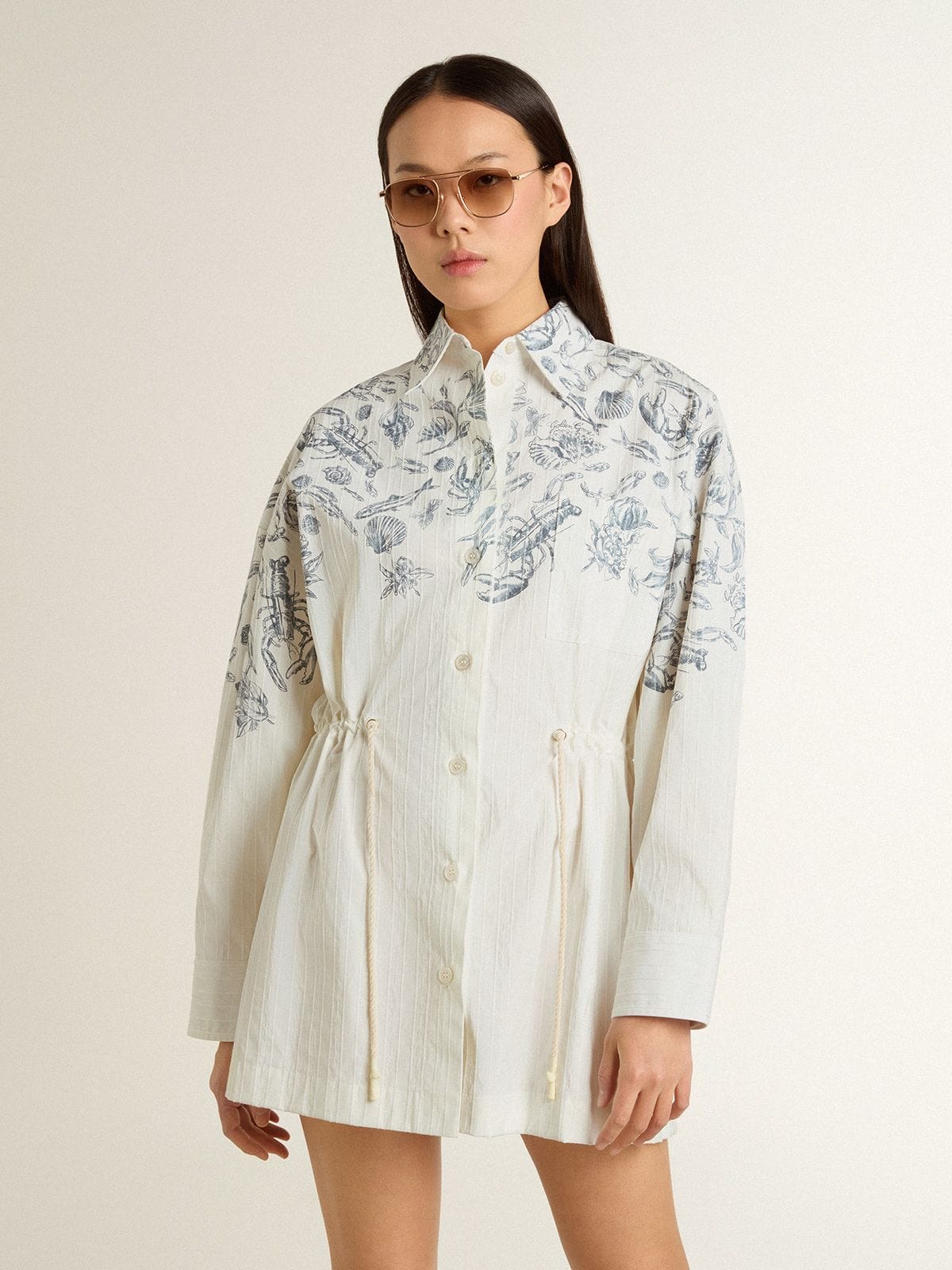 Women's short shirt dress in white striped cotton with a blue marine print