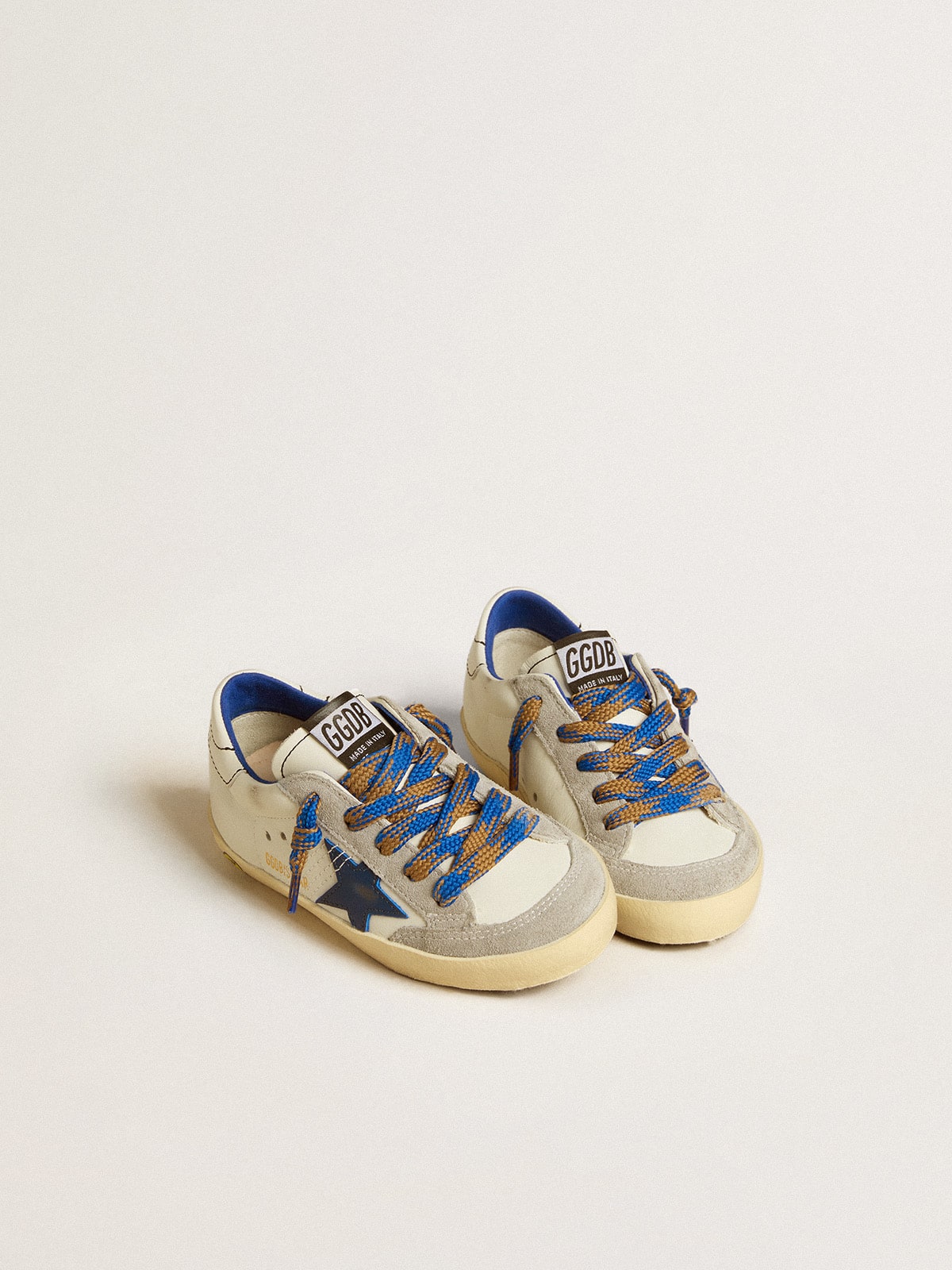 Super-Star Young with blue leather star and ice-gray suede inserts