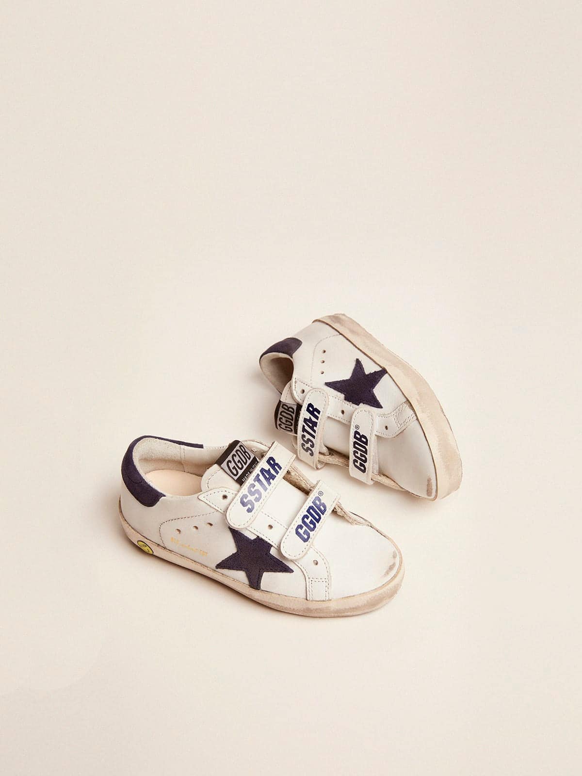 Young Old School in white leather with blue suede star and heel tab