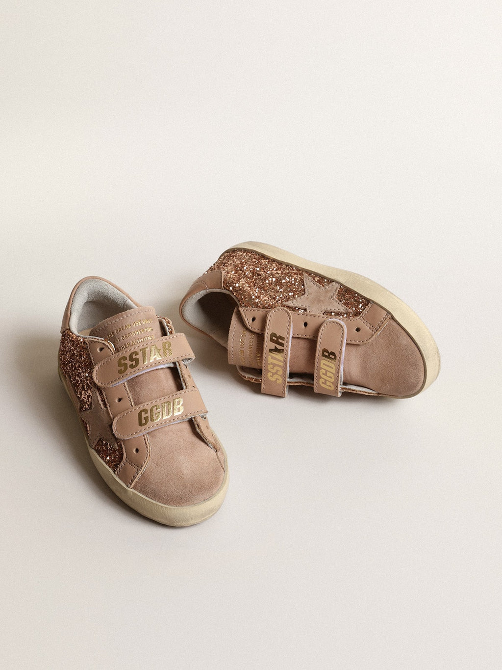 Old School Young in peach-pink glitter with pink suede star