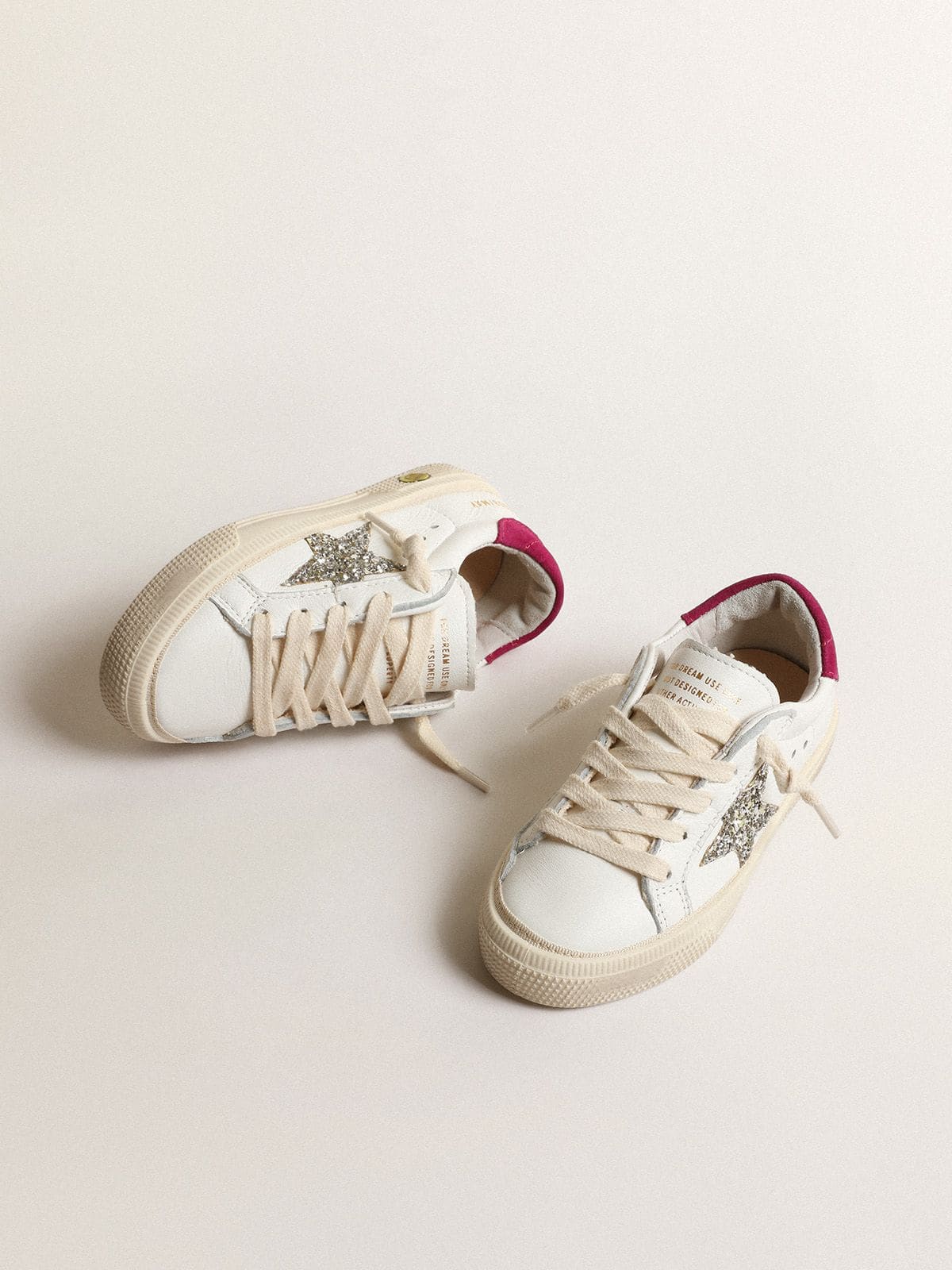 May Young in nappa leather with platinum glitter star and magenta heel tab
