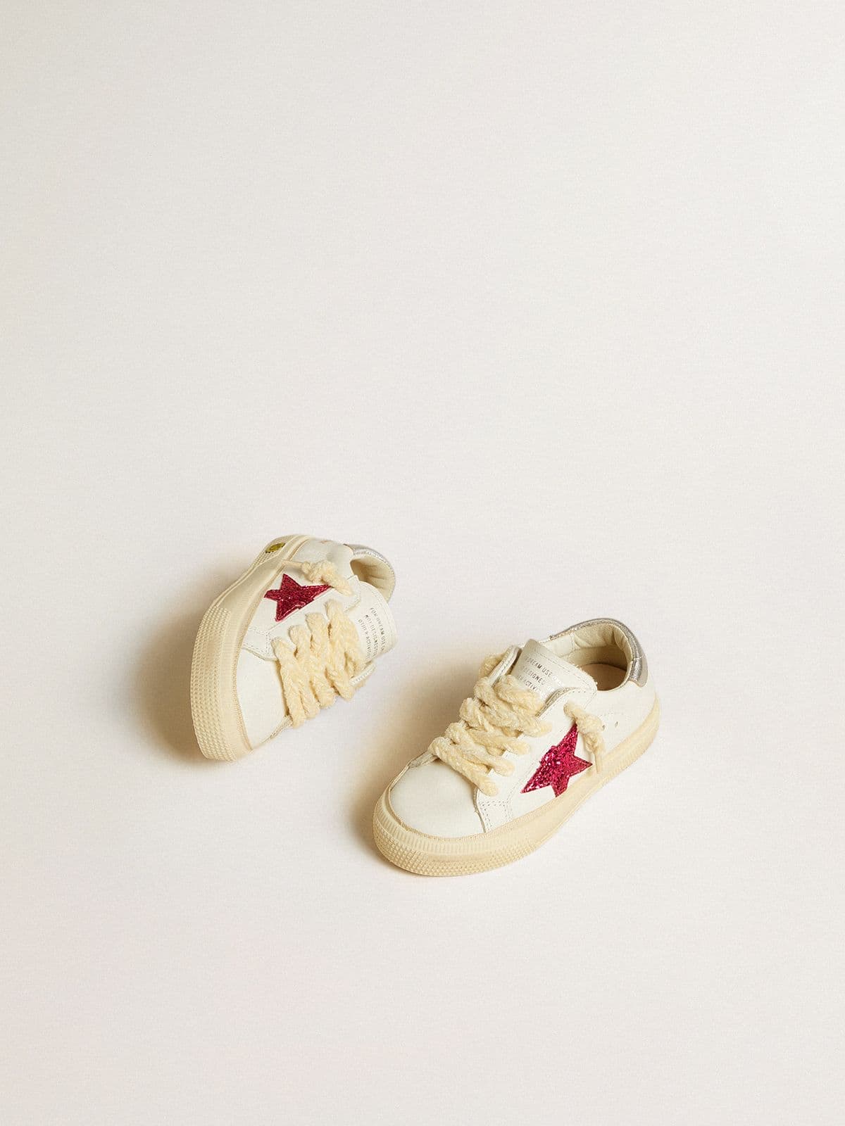 Young May with fuchsia glitter star and metallic leather heel tab
